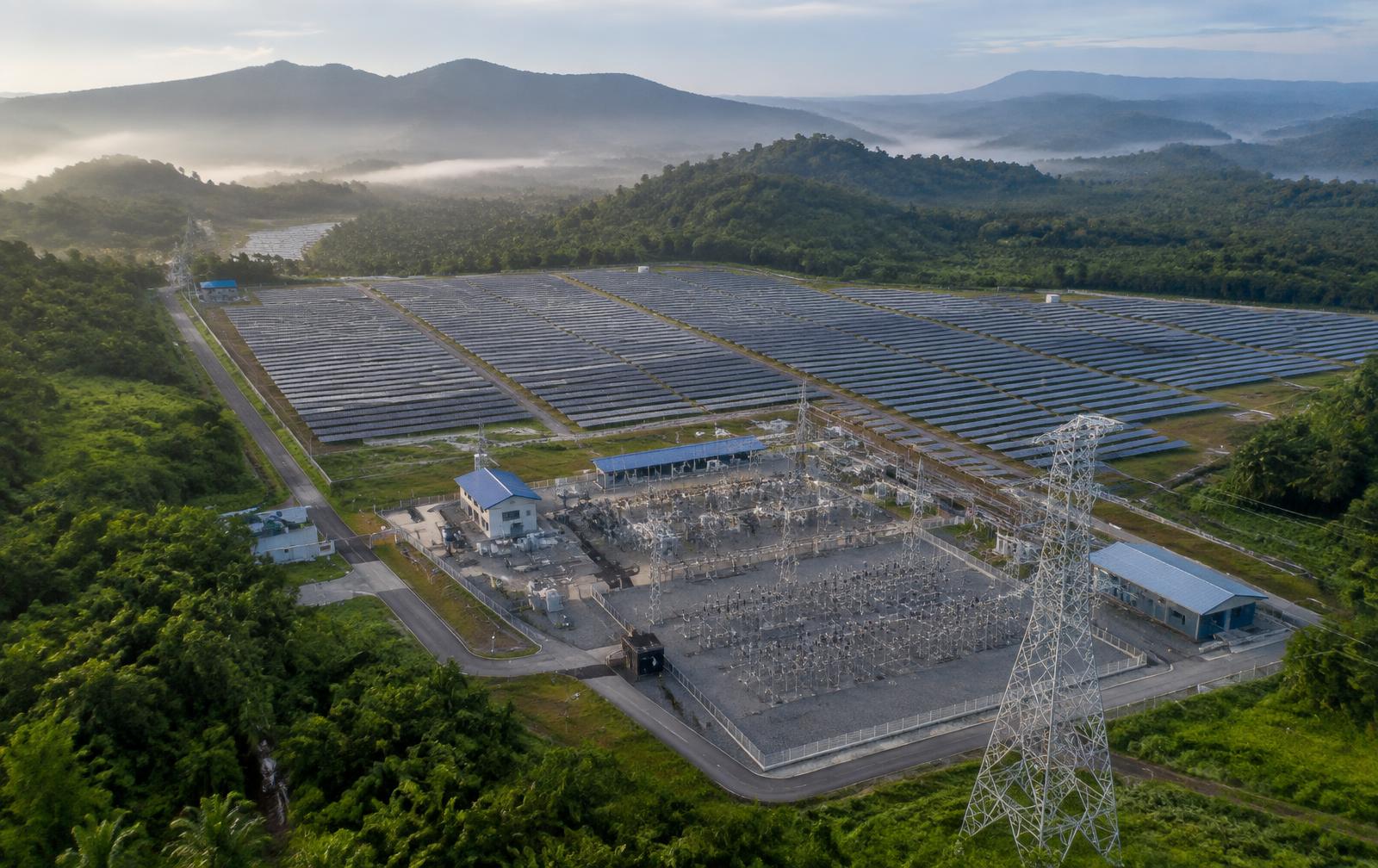 Solar farm and substation in hilly terrain
