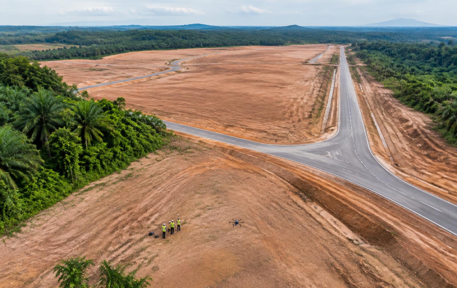 Survey crew and enterprise drone on a development site